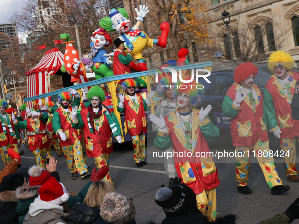 Participants take part in the annual Santa Claus Parade in Toronto, Ontario, Canada, on November 24, 2024. Thousands of people line the stre...