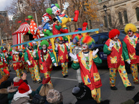 Participants take part in the annual Santa Claus Parade in Toronto, Ontario, Canada, on November 24, 2024. Thousands of people line the stre...