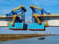 Workers work on the Nanjing-Huai'an Intercity Railway in Huai'an, Jiangsu province, China, on November 24, 2024. (