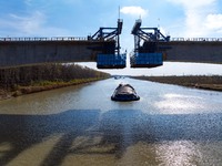 Workers work on the Nanjing-Huai'an Intercity Railway in Huai'an, Jiangsu province, China, on November 24, 2024. (