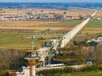 Workers work on the Nanjing-Huai'an Intercity Railway in Huai'an, Jiangsu province, China, on November 24, 2024. (