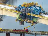 Workers work on the Nanjing-Huai'an Intercity Railway in Huai'an, Jiangsu province, China, on November 24, 2024. (