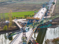 Workers work on the Nanjing-Huai'an Intercity Railway in Huai'an, Jiangsu province, China, on November 24, 2024. (