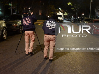 The NYPD Crime Scene Unit investigates the scene and places evidence markers where one man is killed and another man is injured in a shootin...