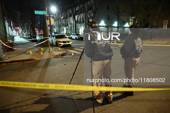 The NYPD Crime Scene Unit investigates the scene and places evidence markers where one man is killed and another man is injured in a shootin...