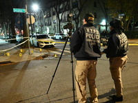 The NYPD Crime Scene Unit investigates the scene and places evidence markers where one man is killed and another man is injured in a shootin...