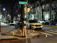 The NYPD Crime Scene Unit investigates the scene and places evidence markers where one man is killed and another man is injured in a shootin...