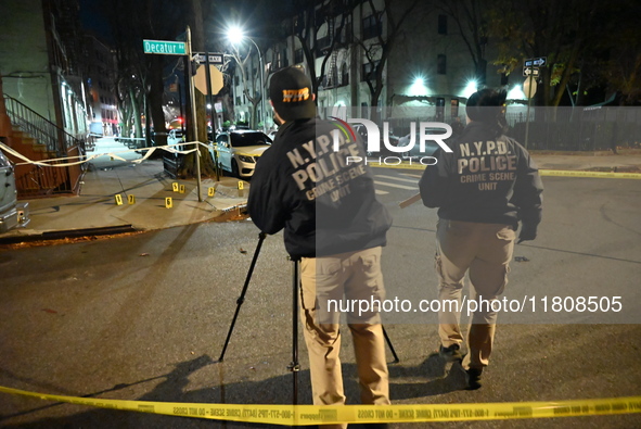 The NYPD Crime Scene Unit investigates the scene and places evidence markers where one man is killed and another man is injured in a shootin...