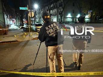 The NYPD Crime Scene Unit investigates the scene and places evidence markers where one man is killed and another man is injured in a shootin...