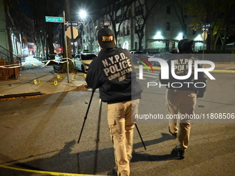 The NYPD Crime Scene Unit investigates the scene and places evidence markers where one man is killed and another man is injured in a shootin...