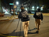 The NYPD Crime Scene Unit investigates the scene and places evidence markers where one man is killed and another man is injured in a shootin...