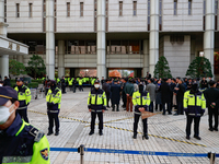 Democratic Party lawmakers wait for the verdict of their leader, Lee Jae-myung, at the Seoul Central District Court in Seocho-gu, Seoul, on...