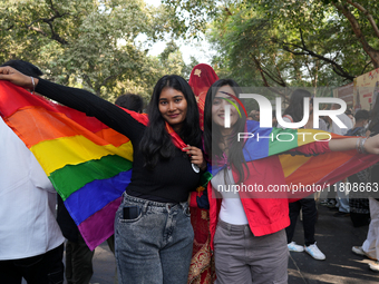 Supporters of the LGBT community participate in the pride march in New Delhi, India, on November 24, 2024. (