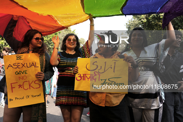 Members of the LGBT community participate in the pride march in New Delhi, India, on November 24, 2024. 