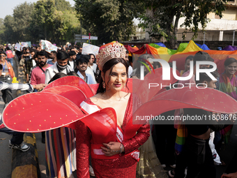 Members of the LGBT community walk during the pride march in New Delhi, India, on November 24, 2024. (