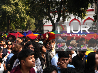 Members of the LGBT community walk with the rainbow flag during the pride march in New Delhi, India, on November 24, 2024. (