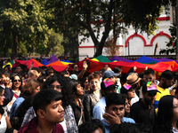 Members of the LGBT community walk with the rainbow flag during the pride march in New Delhi, India, on November 24, 2024. (