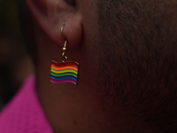 A member of the LGBT community wears a rainbow earring during the pride march in New Delhi, India, on November 24, 2024. (