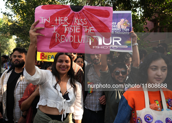 Members of the LGBT community participate in the pride march in New Delhi, India, on November 24, 2024. 