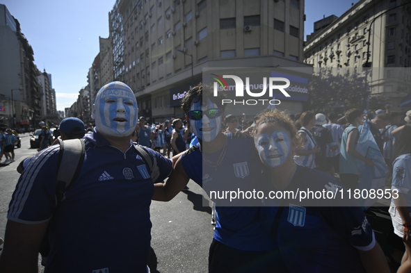 Supporters of Racing Club celebrate the victory of the 2024 Copa Sudamericana in Buenos Aires, Argentina, on November 24, 2024. A massive ga...