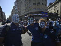 Supporters of Racing Club celebrate the victory of the 2024 Copa Sudamericana in Buenos Aires, Argentina, on November 24, 2024. A massive ga...