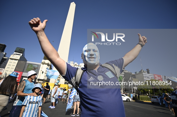 Supporters of Racing Club celebrate the victory of the 2024 Copa Sudamericana in Buenos Aires, Argentina, on November 24, 2024. A massive ga...