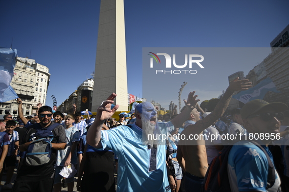 Supporters of Racing Club celebrate the victory of the 2024 Copa Sudamericana in Buenos Aires, Argentina, on November 24, 2024. A massive ga...