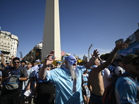 Supporters of Racing Club celebrate the victory of the 2024 Copa Sudamericana in Buenos Aires, Argentina, on November 24, 2024. A massive ga...