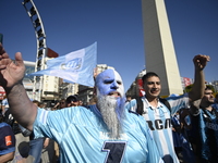 Supporters of Racing Club celebrate the victory of the 2024 Copa Sudamericana in Buenos Aires, Argentina, on November 24, 2024. A massive ga...