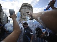 Supporters of Racing Club celebrate the victory of the 2024 Copa Sudamericana in Buenos Aires, Argentina, on November 24, 2024. A massive ga...