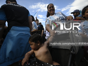 Supporters of Racing Club celebrate the victory of the 2024 Copa Sudamericana in Buenos Aires, Argentina, on November 24, 2024. A massive ga...