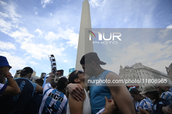 Supporters of Racing Club celebrate the victory of the 2024 Copa Sudamericana in Buenos Aires, Argentina, on November 24, 2024. A massive ga...