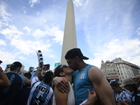 Supporters of Racing Club celebrate the victory of the 2024 Copa Sudamericana in Buenos Aires, Argentina, on November 24, 2024. A massive ga...