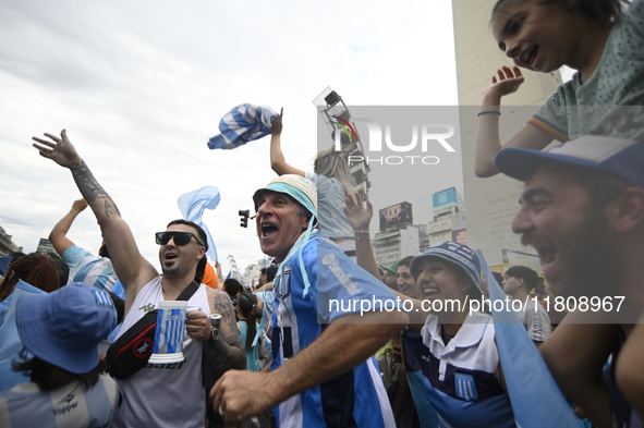 Supporters of Racing Club celebrate the victory of the 2024 Copa Sudamericana in Buenos Aires, Argentina, on November 24, 2024. A massive ga...