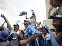 Supporters of Racing Club celebrate the victory of the 2024 Copa Sudamericana in Buenos Aires, Argentina, on November 24, 2024. A massive ga...