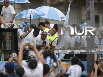 In Buenos Aires, Argentina, on November 24, 2024, the entire Racing Club team, along with the coaching staff and club officials, travels in...