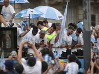 In Buenos Aires, Argentina, on November 24, 2024, the entire Racing Club team, along with the coaching staff and club officials, travels in...