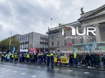 A demonstration against genocide in Palestine takes place on O'Connell Street in Dublin, Ireland, on November 2024. (