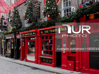 General view of the facade of the famous The Temple Bar pub in Dublin, Ireland, on November 2024 (