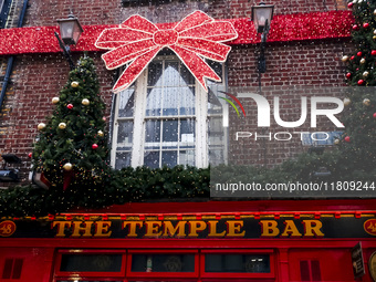 General view of the facade of the famous The Temple Bar pub in Dublin, Ireland, on November 2024 (