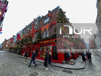 General view of the facade of the famous The Temple Bar pub in Dublin, Ireland, on November 2024 (