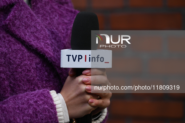 KRAKOW, POLAND - NOVEMBER 24:
A TVP Info microphone held by a TV reporter outside the venue where Karol Nawrocki was officially introduced a...