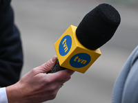 KRAKOW, POLAND - NOVEMBER 24:
A TVN microphone held by a TV reporter outside the venue where Karol Nawrocki was officially introduced as the...