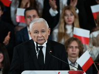 KRAKOW, POLAND - NOVEMBER 24:
Jaroslaw Kaczynski (Center), leader of the opposition Law and Justice party, addresses the crowd during the no...