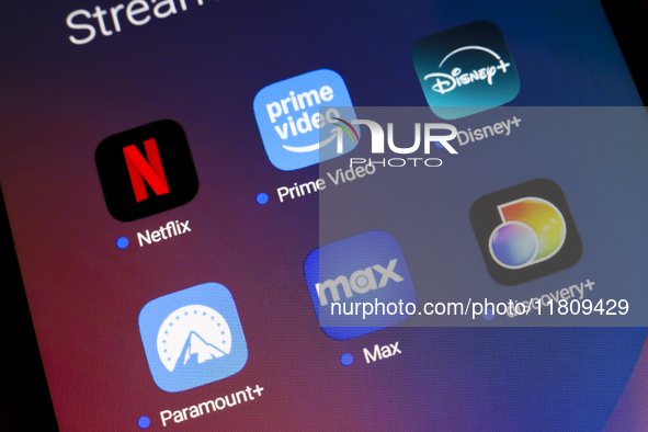 The streaming services Netflix, Amazon Prime Video, Disney Plus, Paramount Plus, Max, and Discovery Plus app soon appear on the screen of a...