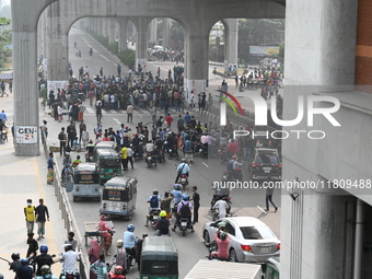 Battery-run Rickshaw Drivers Blocked A Key Road Intersection Demanding That The High Court Order To Stop Battery-run Rickshaw From Playing T...