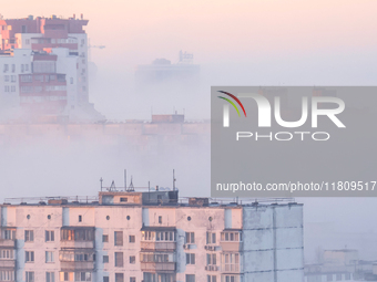 High-rise buildings are seen through the dense fog in Kyiv, Ukraine, on November 25, 2024. NO USE RUSSIA. NO USE BELARUS. (