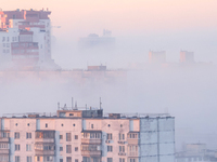 High-rise buildings are seen through the dense fog in Kyiv, Ukraine, on November 25, 2024. NO USE RUSSIA. NO USE BELARUS. (