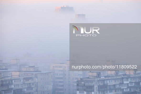 High-rise buildings are seen through the dense fog in Kyiv, Ukraine, on November 25, 2024. NO USE RUSSIA. NO USE BELARUS. 