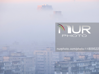 High-rise buildings are seen through the dense fog in Kyiv, Ukraine, on November 25, 2024. NO USE RUSSIA. NO USE BELARUS. (